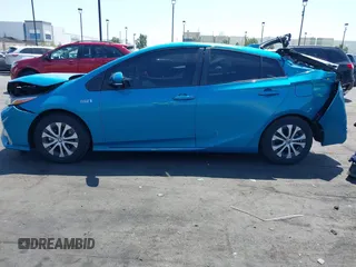 2021 Toyota Prius LE with VIN JTDKAMFP7M3169633, listed as a IAAI auction lot 41986170 with 55,925 mi miles and . Bid and sale history available at DreamBid. Image 15.