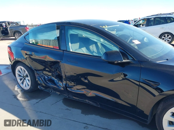 2023 Tesla Model 3 z VIN 5YJ3E1EA4PF552103, wystawiony jako IAAI lot #40782218 z przebiegiem 20 997 mil mil oraz . Historia ofert i sprzedaży dostępna na DreamBid. Obrazek 6.