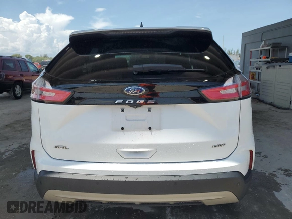 2022 Ford Edge SEL z VIN 2FMPK4J91NBA65180, wystawiony jako Copart lot #55399685 z przebiegiem 79 964 mil mil oraz Czysty tytuł • Clean title. Historia ofert i sprzedaży dostępna na DreamBid. Obrazek 6.