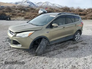 2013 Ford Escape SEL with VIN 1FMCU9HXXDUC70810, listed as a Copart auction lot 85575074 with 111,517 mi miles and Salvage Title. Bid and sale history available at carsss.com. Image 1.