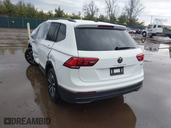 2024 Volkswagen Tiguan S with VIN 3VVFB7AX2RM092023, listed as a IAAI auction lot 41894241 with 10,395 mi miles and . Bid and sale history available at DreamBid. Image 3.