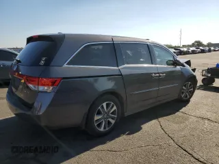 2016 Honda Odyssey Touring Elite with VIN 5FNRL5H91GB092214, listed as a Copart auction lot 61158745 with 121,477 mi miles and Salvage title. Bid and sale history available at DreamBid. Image 3.