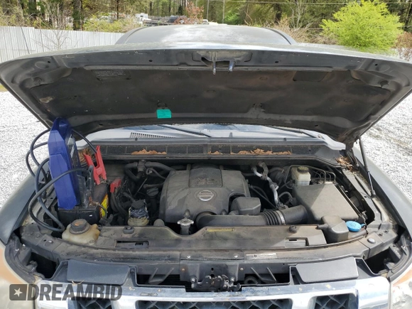 2010 Nissan Titan XE with VIN 1N6BA0EJ1AN312188, listed as a Copart auction lot 50984505 with 391,186 mi miles and Salvage Title. Bid and sale history available at carsss.com. Image 11.