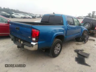 2018 Toyota Tacoma SR5 with VIN 3TMAZ5CN3JM066409, listed as a IAAI auction lot 41204775 with 75,000 mi miles and . Bid and sale history available at DreamBid. Image 4.