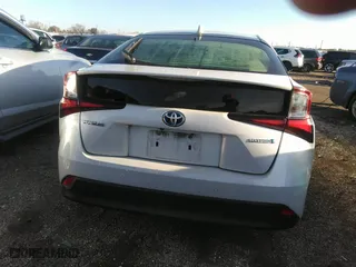 2022 Toyota Prius L Eco with VIN JTDKAMFU5N3156063, listed as a IAAI auction lot 41214358 with 208,666 mi miles. Bid and sale history available at carsss.com. Image 17.