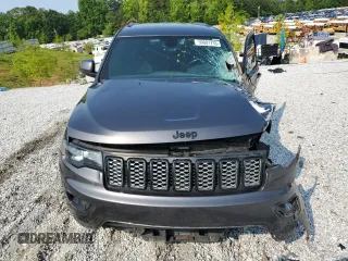 2018 Jeep Grand Cherokee Altitude with VIN 1C4RJEAG4JC145023, listed as a Copart auction lot 59001735 with 127,627 mi miles and Salvage title. Bid and sale history available at DreamBid. Image 5.