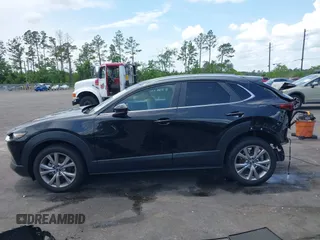 2023 Mazda CX-30 S Carbon Edition с VIN 3MVDMBCM7PM549197, выставлен на аукционе IAAI как лот 42224977 с пробегом 22 201 миль миль и . История ставок и продаж доступна на DreamBid. Изображение 14.