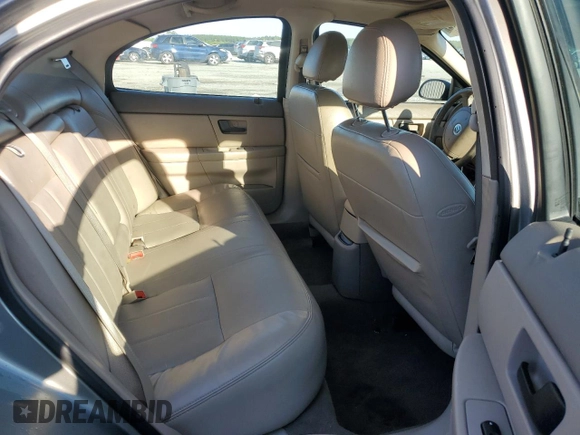 2004 Mercury Sable LS Premium with VIN 1MEHM55S84A614002, listed as a Copart auction lot 56582965 with 185,589 mi miles and Salvage title. Bid and sale history available at DreamBid. Image 10.