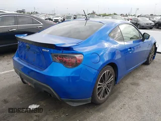 2014 Subaru BRZ Limited with VIN JF1ZCAC14E9604832, listed as a IAAI auction lot 41894512 with 97,729 mi miles. Bid and sale history available at carsss.com. Image 4.