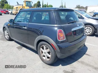 2008 MINI Hardtop with VIN WMWMF33538TT64168, listed as a IAAI auction lot 41976279 with 115,039 mi miles and . Bid and sale history available at DreamBid. Image 3.