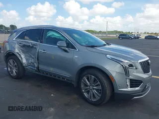 2023 Cadillac XT5 FWD Premium Luxury with VIN 1GYKNCRS7PZ196146, listed as a IAAI auction lot 42543415 with 9,960 mi miles and . Bid and sale history available at DreamBid. Image 1.