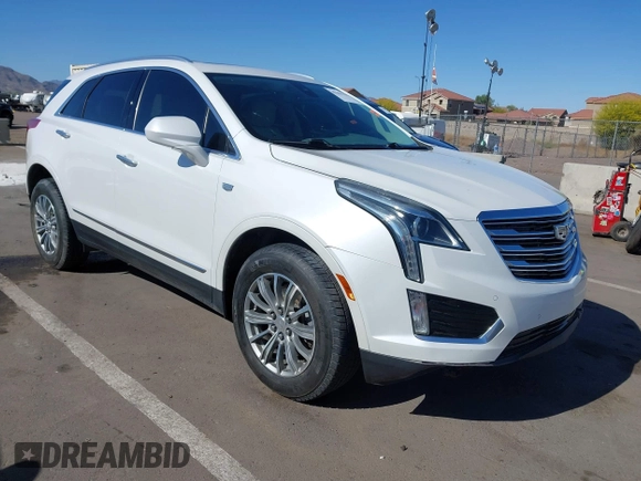 2017 Cadillac XT5 Luxury AWD z VIN 1GYKNDRS8HZ120863, wystawiony jako IAAI lot #42101279 z przebiegiem 100 535 mil mil oraz . Historia ofert i sprzedaży dostępna na DreamBid. Obrazek 1.