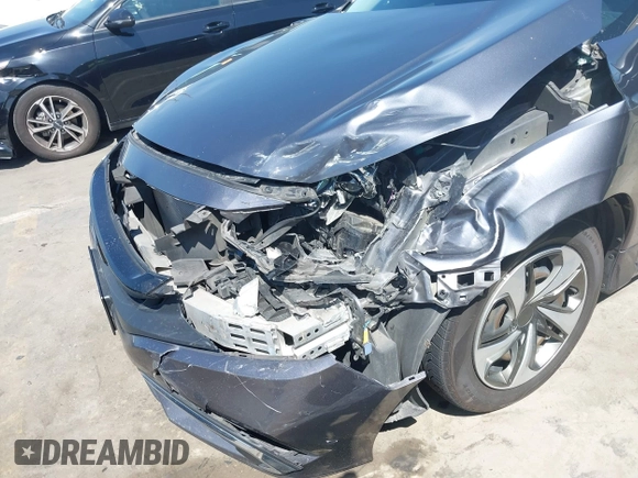 2020 Honda Civic LX with VIN 2HGFC2F67LH551651, listed as a IAAI auction lot 41861966 with 205,619 mi miles and . Bid and sale history available at DreamBid. Image 6.