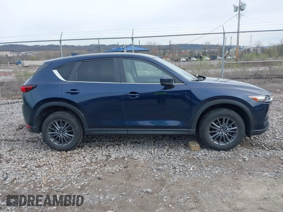 2019 Mazda CX-5 Touring with VIN JM3KFBCM5K0689948, listed as a IAAI auction lot 41976266 with 74,812 mi miles. Bid and sale history available at carsss.com. Image 13.