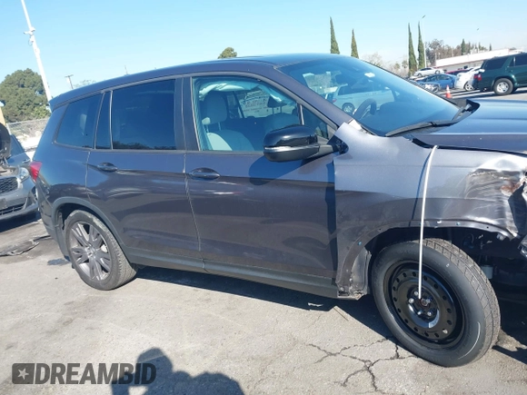 2019 Honda Passport EX-L with VIN 5FNYF7H58KB006501, listed as a IAAI auction lot 41752416 with 60,820 mi miles and . Bid and sale history available at carsss.com. Image 13.