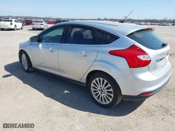 2012 Ford Focus Titanium with VIN 1FAHP3N20CL402944, listed as a IAAI auction lot 41784935 with NaN miles. Bid and sale history available at carsss.com. Image 3.