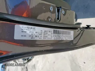 2018 Jeep Cherokee Limited z VIN 1C4PJLDX4JD556701, wystawiony jako Copart lot #58723505 z przebiegiem Nie podano mil oraz Szkoda całkowita • Salvage title. Historia ofert i sprzedaży dostępna na DreamBid. Obrazek 13.