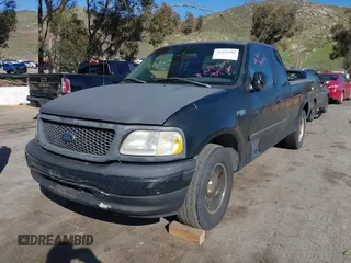 2000 Ford F-150 XL with VIN 1FTRX17W3YNB90314, listed as a IAAI auction lot 41825498 with 369,372 mi miles. Bid and sale history available at carsss.com. Image 2.