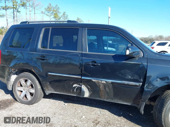 2013 Honda Pilot Touring with VIN 5FNYF4H9XDB047796, listed as a IAAI auction lot 41591189 with 188,579 mi miles and . Bid and sale history available at carsss.com. Image 6.