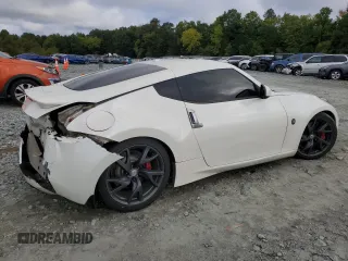 2013 Nissan 370Z with VIN JN1AZ4EH2DM381951, listed as a Copart auction lot 73913174 with 71,583 mi miles and Salvage Title. Bid and sale history available at carsss.com. Image 3.