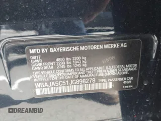 2018 BMW 5 Series 530i with VIN WBAJA5C51JG898278, listed as a IAAI auction lot 42595701 with 96,777 mi miles and . Bid and sale history available at DreamBid. Image 9.