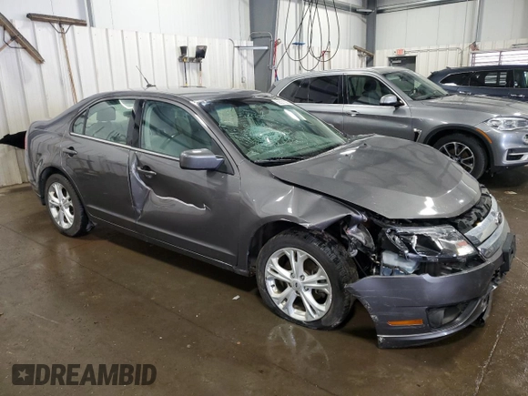 2012 Ford Fusion SE with VIN 3FAHP0HG9CR323277, listed as a Copart auction lot 59501005 with 84,658 mi miles and Salvage title. Bid and sale history available at DreamBid. Image 4.