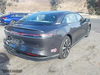 2024 Lucid Air Pure with VIN 50EA1PGA4RA004886, listed as a IAAI auction lot 41349451 with 4,165 mi miles. Bid and sale history available at carsss.com. Image 4.