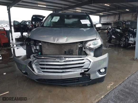 2019 Chevrolet Traverse LT Cloth with VIN 1GNEVGKW1KJ135509, listed as a IAAI auction lot 41283639 with 77,327 mi miles. Bid and sale history available at carsss.com. Image 12.