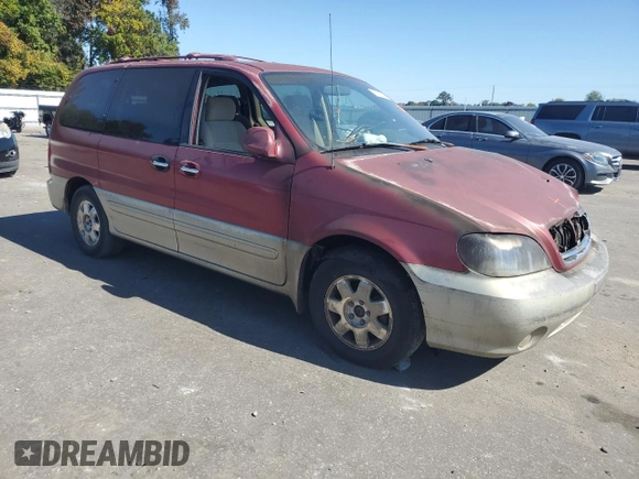 2003 Kia Sedona LX with VIN KNDUP131636364111, listed as a Copart auction lot 77393214 with 0 mi miles and Salvage Title. Bid and sale history available at carsss.com. Image 4.