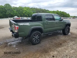 2021 Toyota Tacoma SR with VIN 3TYCZ5AN9MT010768, listed as a Copart auction lot 53961455 with 55,822 mi miles and Salvage title. Bid and sale history available at DreamBid. Image 3.