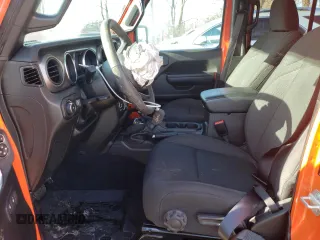2023 Jeep Wrangler Sport with VIN 1C4HJXDG8PW687459, listed as a Copart auction lot 87302924 with 16,637 mi miles and Salvage Title. Bid and sale history available at DreamBid. Image 7.