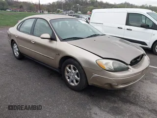 2000 Ford Taurus SES z VIN 1FAFP5523YG137665, wystawiony jako IAAI lot #41942657 z przebiegiem 104 738 mil mil oraz . Historia ofert i sprzedaży dostępna na DreamBid. Obrazek 1.