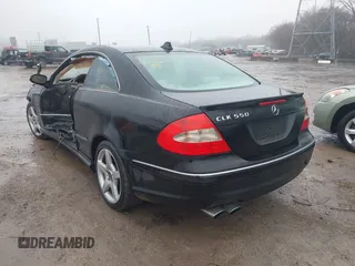 2007 Mercedes-Benz CLK-Class 5.5L with VIN WDBTJ72H77F214706, listed as a IAAI auction lot 41471332 with 87,310 mi miles. Bid and sale history available at carsss.com. Image 3.