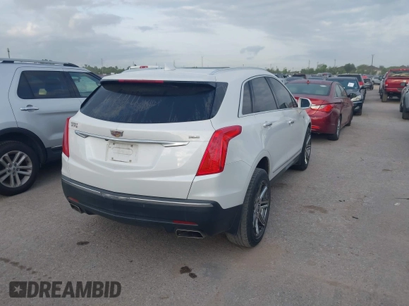 2017 Cadillac XT5 Luxury FWD with VIN 1GYKNBRS2HZ108745, listed as a IAAI auction lot 42022579 with 147,413 mi miles. Bid and sale history available at carsss.com. Image 4.