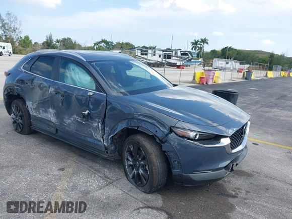 2023 Mazda CX-30 S Carbon Edition with VIN 3MVDMBCM4PM579080, listed as a IAAI auction lot 41941082 with 5,444 mi miles and . Bid and sale history available at DreamBid. Image 1.