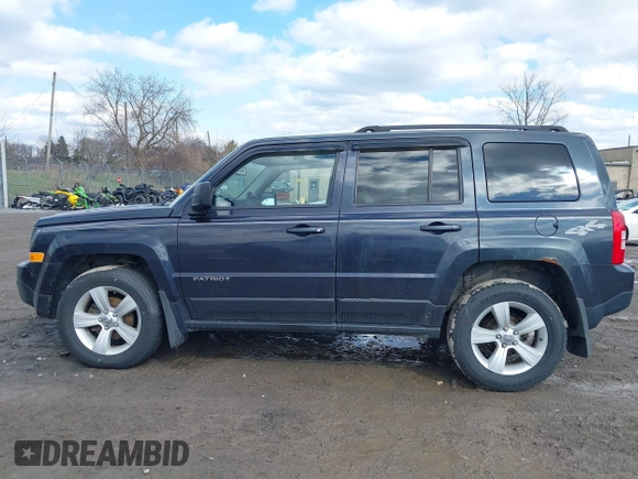 2014 Jeep Patriot Latitude with VIN 1C4NJRFB9ED778409, listed as a IAAI auction lot 41952027 with 88,306 mi miles and . Bid and sale history available at DreamBid. Image 14.