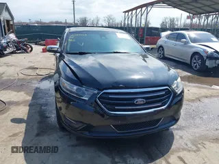 2014 Ford Taurus Limited with VIN 1FAHP2F80EG104984, listed as a IAAI auction lot 41910463 with 174,034 mi miles. Bid and sale history available at carsss.com. Image 12.