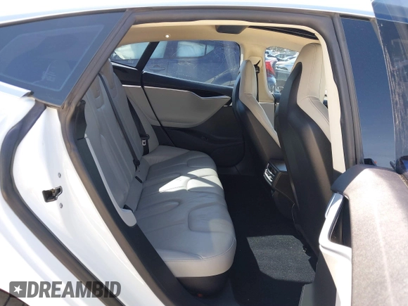 2014 Tesla Model S 60 with VIN 5YJSA1H15EFP46980, listed as a IAAI auction lot 41583672 with 61,080 mi miles and . Bid and sale history available at DreamBid. Image 7.
