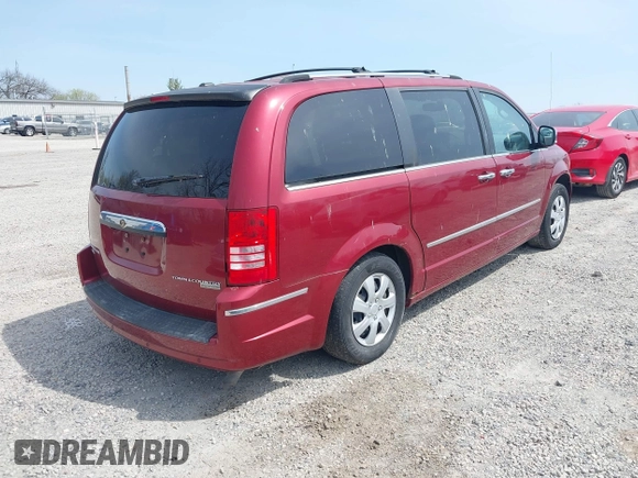2010 Chrysler Town & Country Limited with VIN 2A4RR7DX2AR358067, listed as a IAAI auction lot 42065257 with 188,290 mi miles and . Bid and sale history available at carsss.com. Image 4.