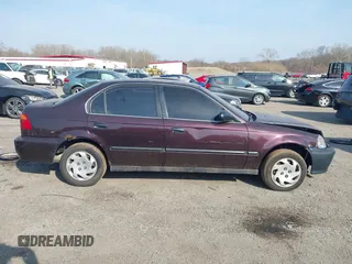 2000 Honda Civic LX with VIN 2HGEJ6675YH528894, listed as a IAAI auction lot 41800415 with 444,713 mi miles. Bid and sale history available at carsss.com. Image 13.