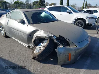 2004 Nissan 350Z Touring with VIN JN1AZ34E84T060682, listed as a IAAI auction lot 41616199 with 209,814 mi miles. Bid and sale history available at carsss.com. Image 6.