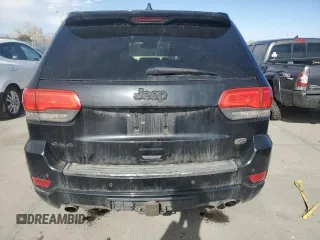 2014 Jeep Grand Cherokee Overland with VIN 1C4RJFCT2EC106002, listed as a Copart auction lot 48763675 with 143,011 mi miles and Salvage Title. Bid and sale history available at DreamBid. Image 6.