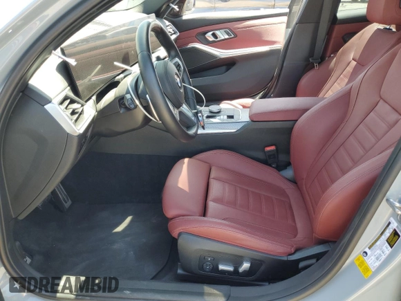 2023 BMW 3 Series 330i with VIN 3MW69FF00P8D52700, listed as a Copart auction lot 61629485 with 12,007 mi miles and Salvage title. Bid and sale history available at DreamBid. Image 7.
