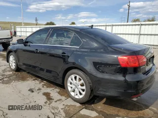 2014 Volkswagen Jetta SE с VIN 3VWD17AJ0EM332598, выставлен на аукционе Copart как лот 52392395 с пробегом 66 389 миль миль и Списание • Salvage title. История ставок и продаж доступна на DreamBid. Изображение 2.