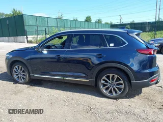 2019 Mazda CX-9 Grand Touring with VIN JM3TCBDY6K0335886, listed as a IAAI auction lot 42704250 with 37,171 mi miles and . Bid and sale history available at DreamBid. Image 13.