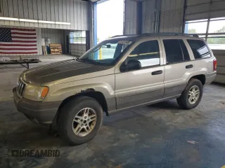 2003 Jeep Grand Cherokee Laredo with VIN 1J4GW48S43C567559, listed as a Copart auction lot 61431595 with 249,998 mi miles and Salvage title. Bid and sale history available at DreamBid. Image 1.