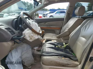 2006 Lexus RX 330 with VIN 2T2GA31U76C046515, listed as a Copart auction lot 63557655 with 302,374 mi miles and Salvage title. Bid and sale history available at DreamBid. Image 7.