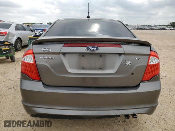 2010 Ford Fusion SE z VIN 3FAHP0HA1AR382364, wystawiony jako Copart lot #54963665 z przebiegiem 155 825 mil mil oraz Czysty tytuł • Clean title. Historia ofert i sprzedaży dostępna na DreamBid. Obrazek 6.