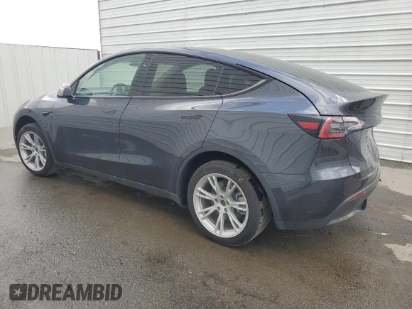 2024 Tesla Model Y with VIN 7SAYGDED4RF017614, listed as a Copart auction lot 45754675 with 11,209 mi miles and Salvage title. Bid and sale history available at DreamBid. Image 2.