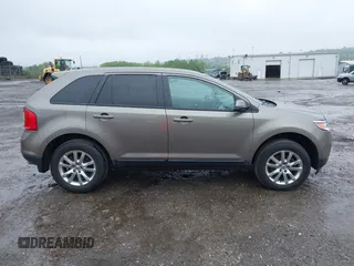 2014 Ford Edge SEL z VIN 2FMDK4JC0EBA36381, wystawiony jako IAAI lot #42236973 z przebiegiem 146 053 mil mil oraz . Historia ofert i sprzedaży dostępna na DreamBid. Obrazek 13.